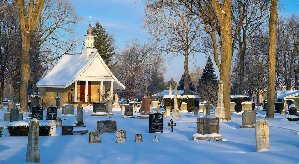 Cemetery in Winter with Sun