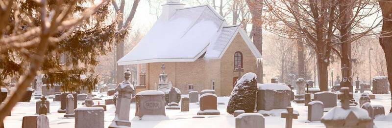 All Saints Chapel and Tombstones in Winter
